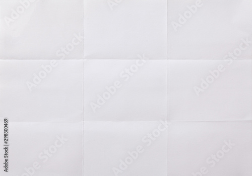 white textured sheet of paper folded