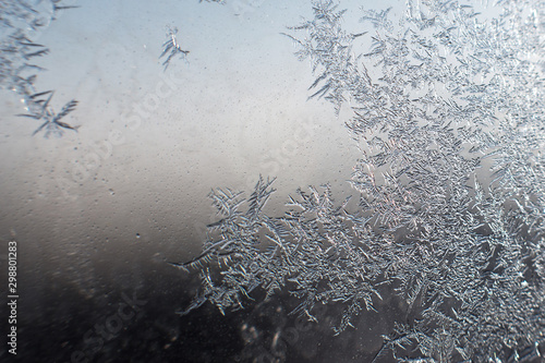 Obraz na plátně snow pattern on the glass from frost