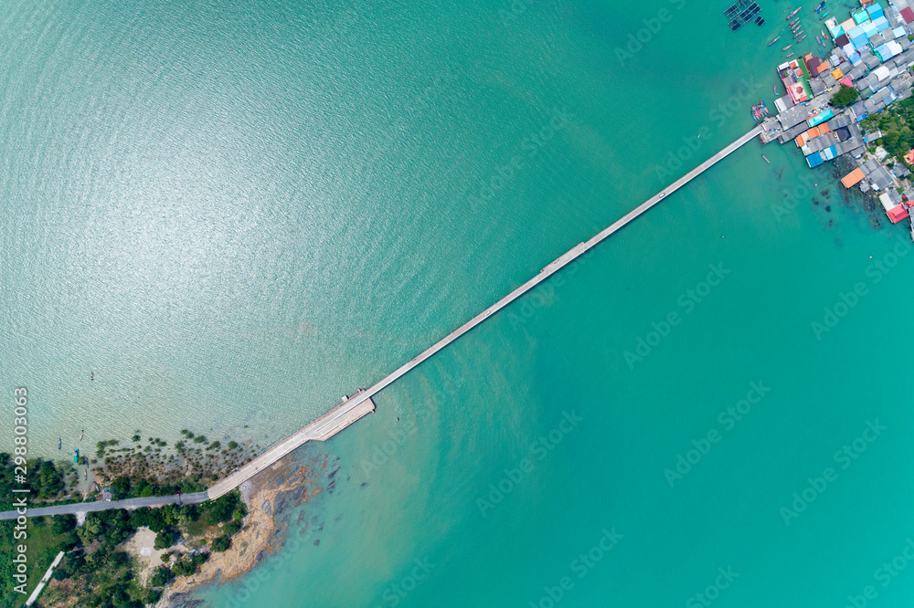 Drone view Top down of small bridge to koh rat in Surat Thani thailand Drone view Top down of small bridge to koh rat in Surat Thani thailand