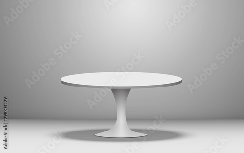 white round table in the white studio room