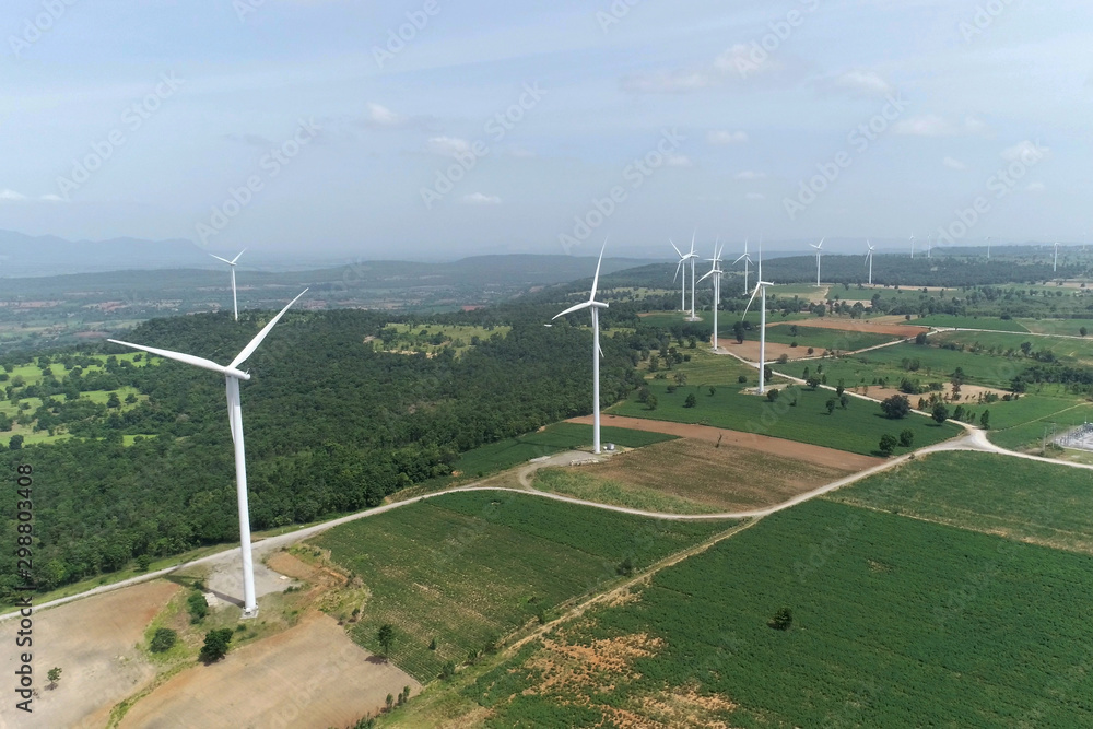 Wind turbine is alternative electrical power with blue sky, summer field, renewable energy Wind turbine is alternative electrical power with blue sky, summer field, renewable energy
