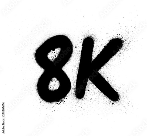 graffiti 8K abbreviation sprayed in black over white
