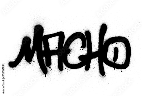 graffiti macho word sprayed in black over white