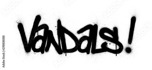 graffiti vandals word sprayed in blaack over white