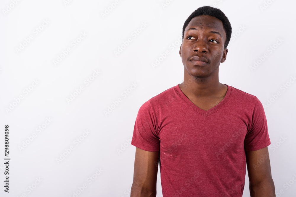 Young handsome African man against white background Young handsome African man against white background