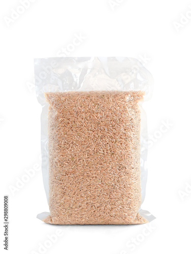 Brown rice in vacuum plastic bag isolated on white background