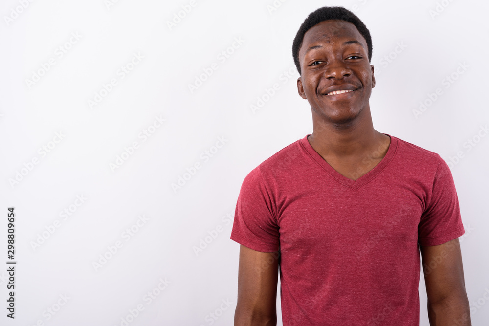 Young handsome African man against white background Young handsome African man against white background