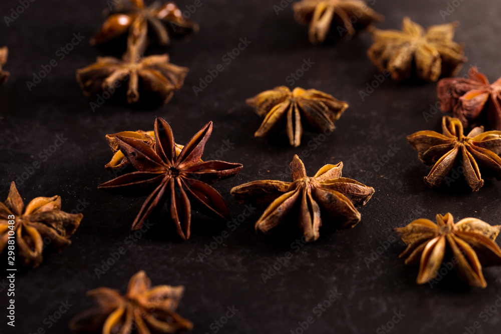 Star anise on black table. Concept, copy space. Star anise on black table. Concept, copy space.