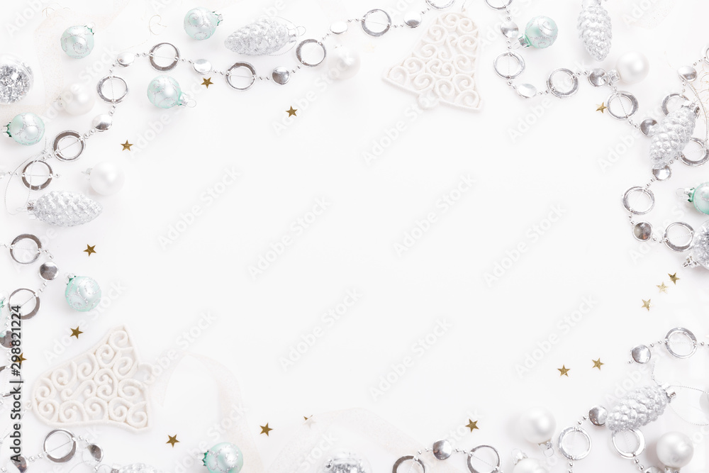 Christmas composition. Christmas balls, blue and silver decorations on white background. Christmas composition. Christmas balls, blue and silver decorations on white background.