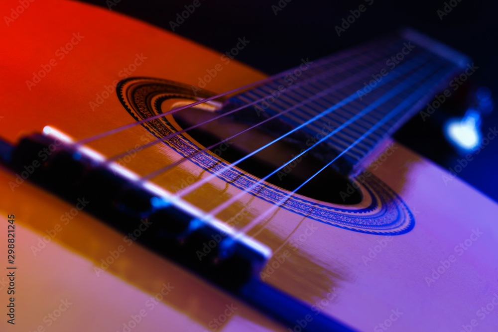 Guitar, perspective view with color lighting.