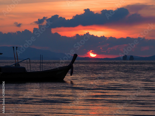 Silhouette of long tail boat with sunset background , Koh yao yai , Thailand