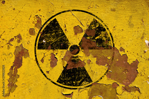 Fototapeta Black radioactive sign over yellow background