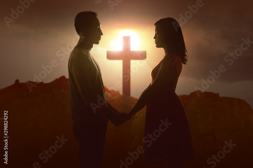 Asian couple holding hands ...