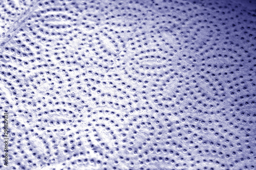 Paper towel tissue texture with blur effect in blue tone.