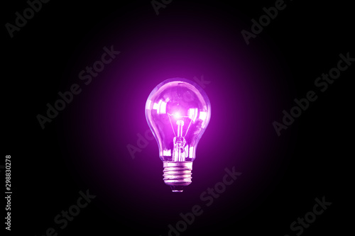 Lamp bulb on the black background. New idea concept.