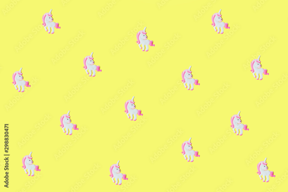 Pink unicorns on yellow backdrop. Pink unicorns on yellow backdrop.
