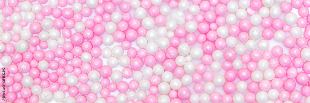 Header, pink and white sugar pearls or nonpareille background