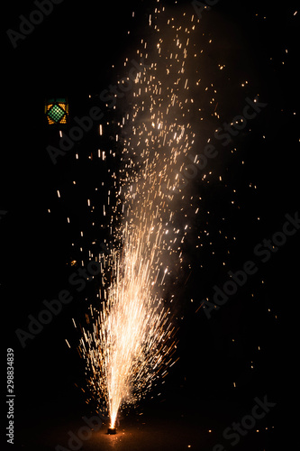 yellow fountain firework bursting photo