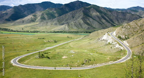 Mountain serpentine loop. The beginning of the Chike Taman mountain pass. Altai. Siberia.