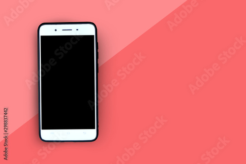 Smartphone on pink background and smart technology concept