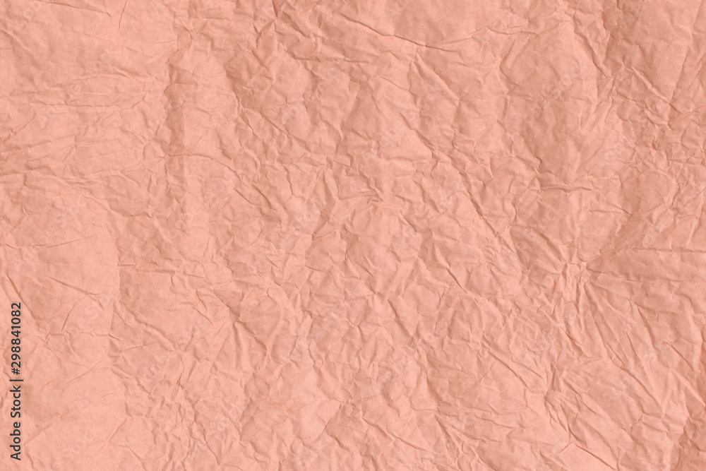 Fototapeta premium Trendy Cantaloupe colored textured background. Crumpled paper texture.