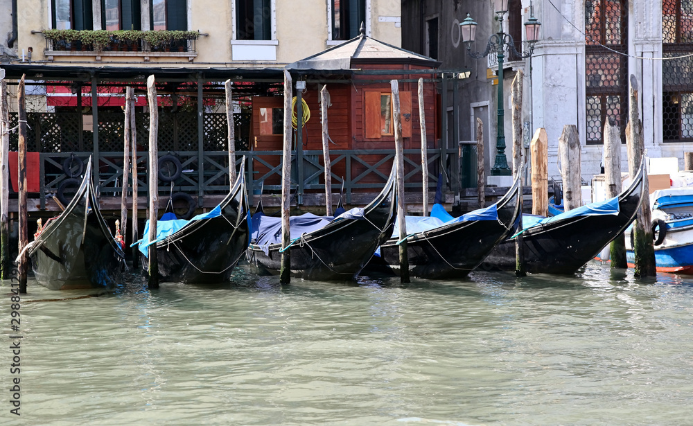 A Row of Gondolas in Venice - Italy