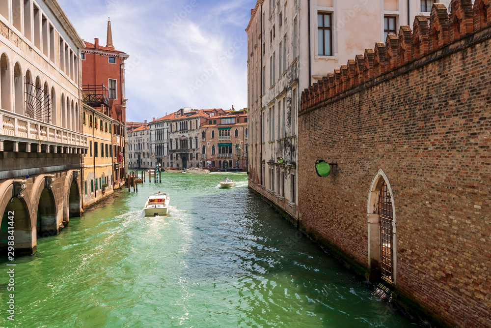 picturesque view at chanel in Venice with boats and nice old builginds  behind , ships with palaces on the background of the landscape Stock Photo  | Adobe Stock