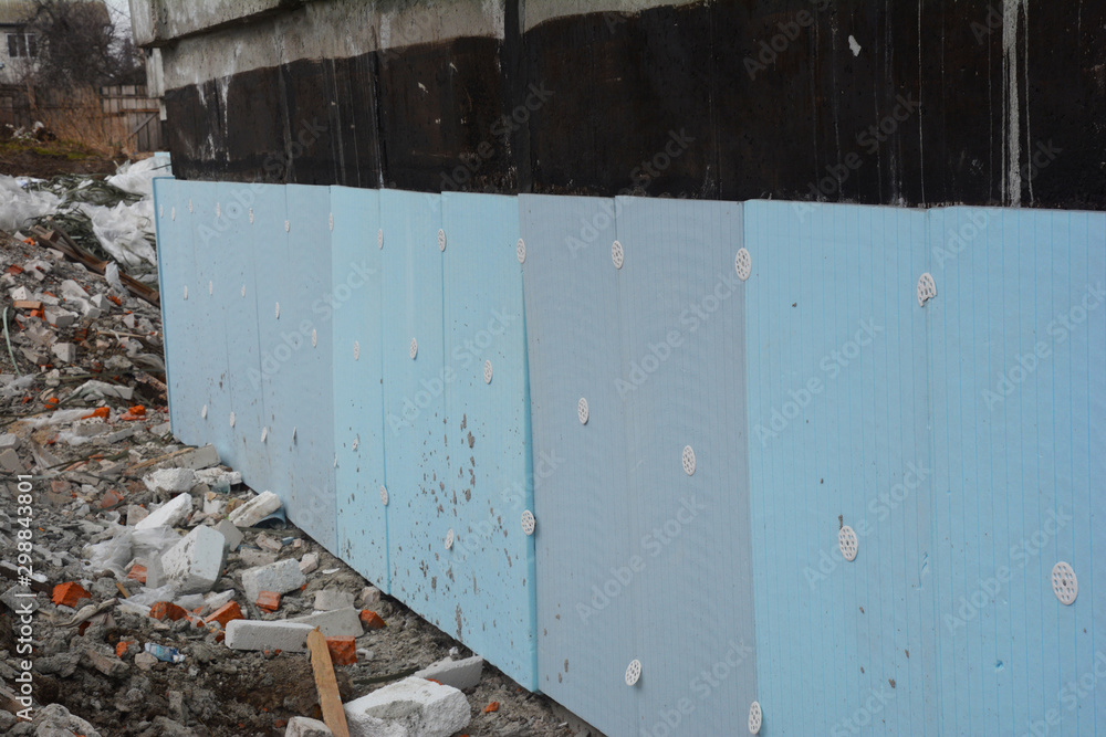 House foundation rigid insulation details with damp proofing and
