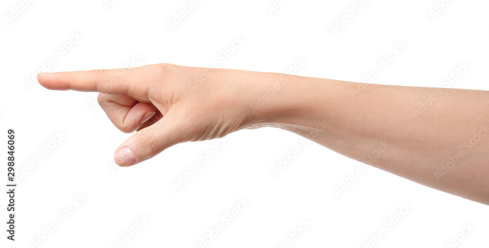 Hand of woman pointing at something on white background Hand of woman pointing at something on white background