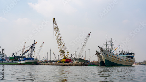  Sunda Kelapa port cityscape, Jakarta, Indonesia photo