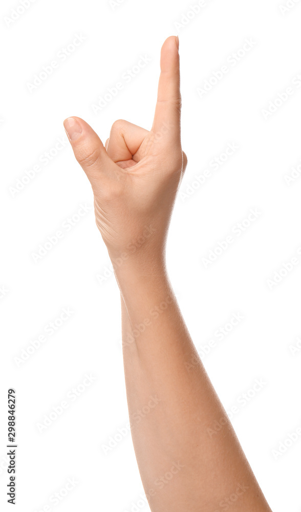 Hand of woman pointing at something on white background Hand of woman pointing at something on white background