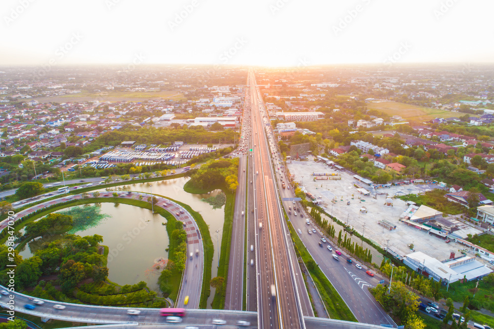 Fototapeta premium Busy intersection traffic city road with vehicle movement