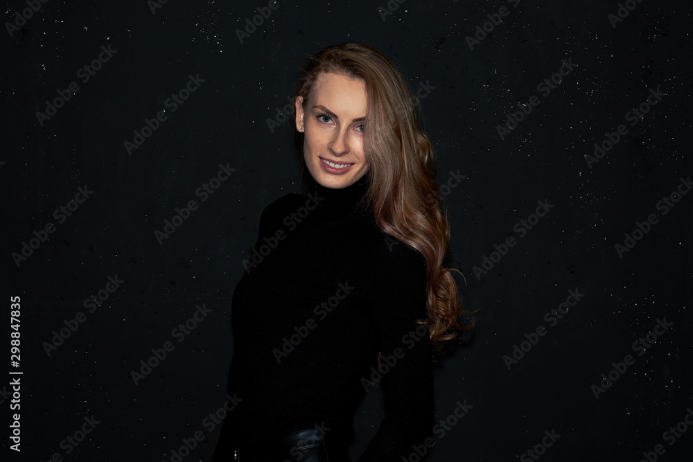 Happy smiling girl over night sky dark background Happy smiling girl over night sky dark background