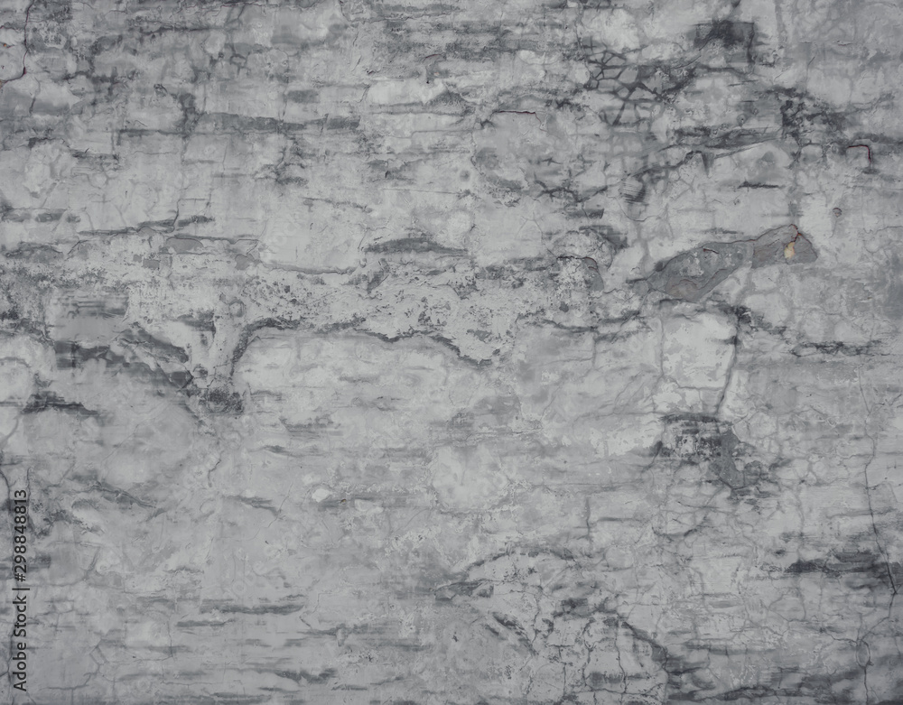 Texture of gray old plastered wall with cracks. Horizontal image.