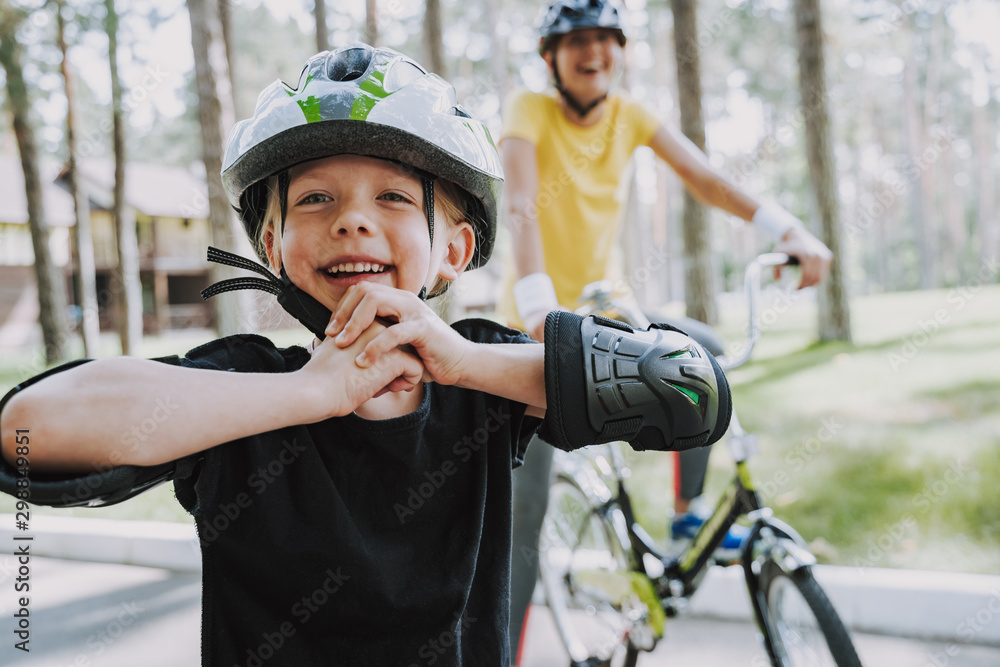 Cute little girl enjoying bicycle ride outdoors Cute little girl enjoying bicycle ride outdoors