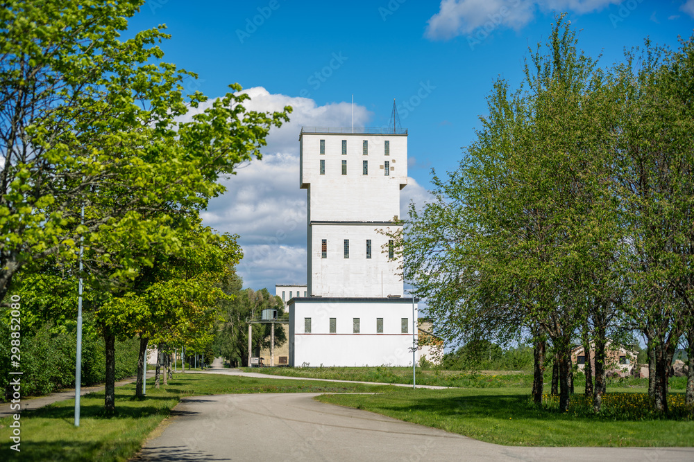 Fototapeta premium White head frame or shaft from a closed down mining area in Sweden