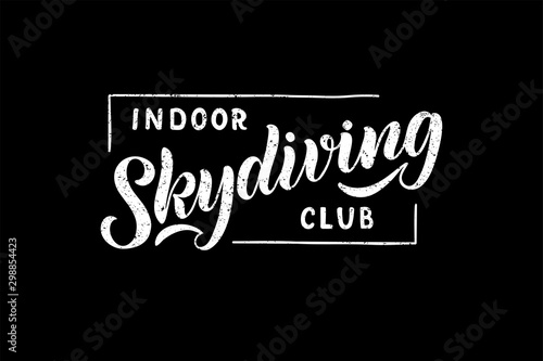 Indoor skydiving club hand drawn lettering logo, emblem on black background..