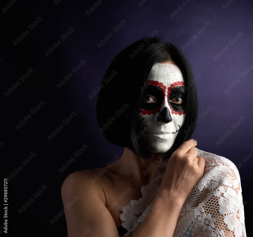 woman with black short hair in white makeup Sugar head to the day of the dead
