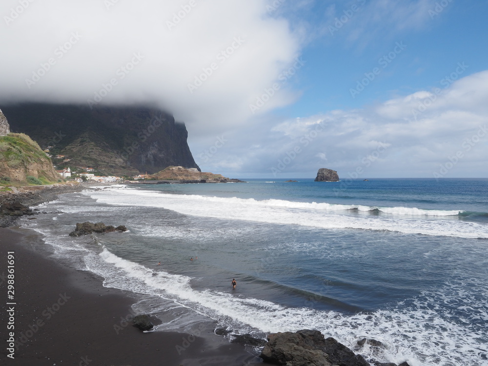 Ocean and black sand