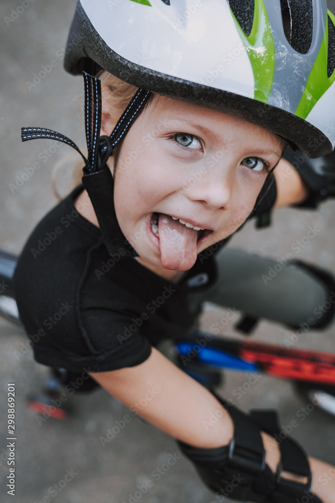 Cute little girl sticking out her tongue Cute little girl sticking out her tongue