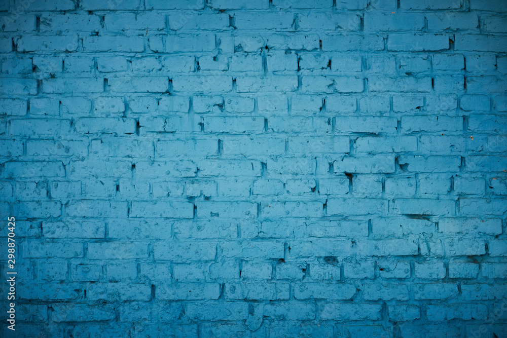 Fototapeta premium old red brick Brick wall painted with deep blue paint
