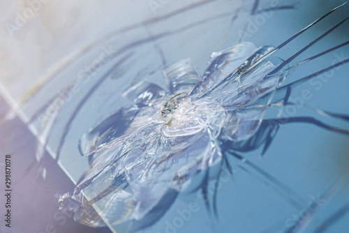 Fotografie Smashed windscreen of a car, damaged glass
