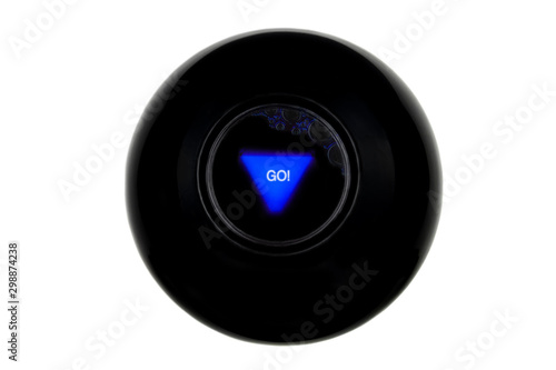 Magic 8 ball with prediction GO isolated on white background photo