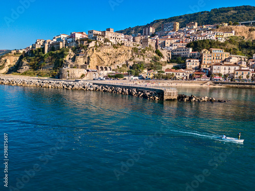 Aerial view of Pizzo Calabro, pier, castle, Calabria, tourism Italy. Panoramic view of the small town of Pizzo Calabro by the sea. Houses on the rock. On the cliff stands the Aragonese castle