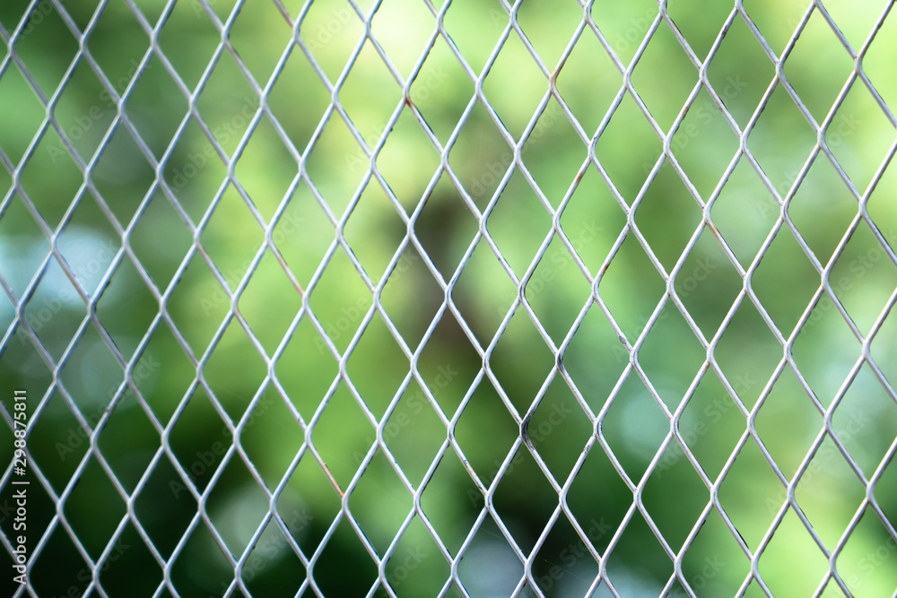 Fototapeta premium Chain link from realistic steel on green background.