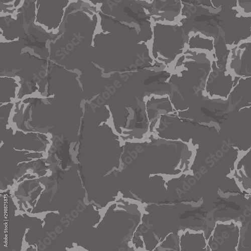 Dark camouflage of various shades of grey and brown colors