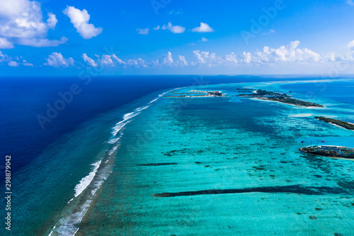 Aerial view, lagoon of a Maldives island with corals from above, South Male Atoll, Maldives photo