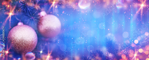 Christmas and New Year holidays background. Glitter lights backdrop. Winter season. Text space. Closeup of Christmas-tree.