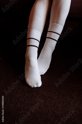 A woman feet with a white socks