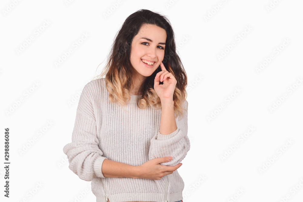Portrait of young latin woman in a studio. Portrait of young latin woman in a studio.
